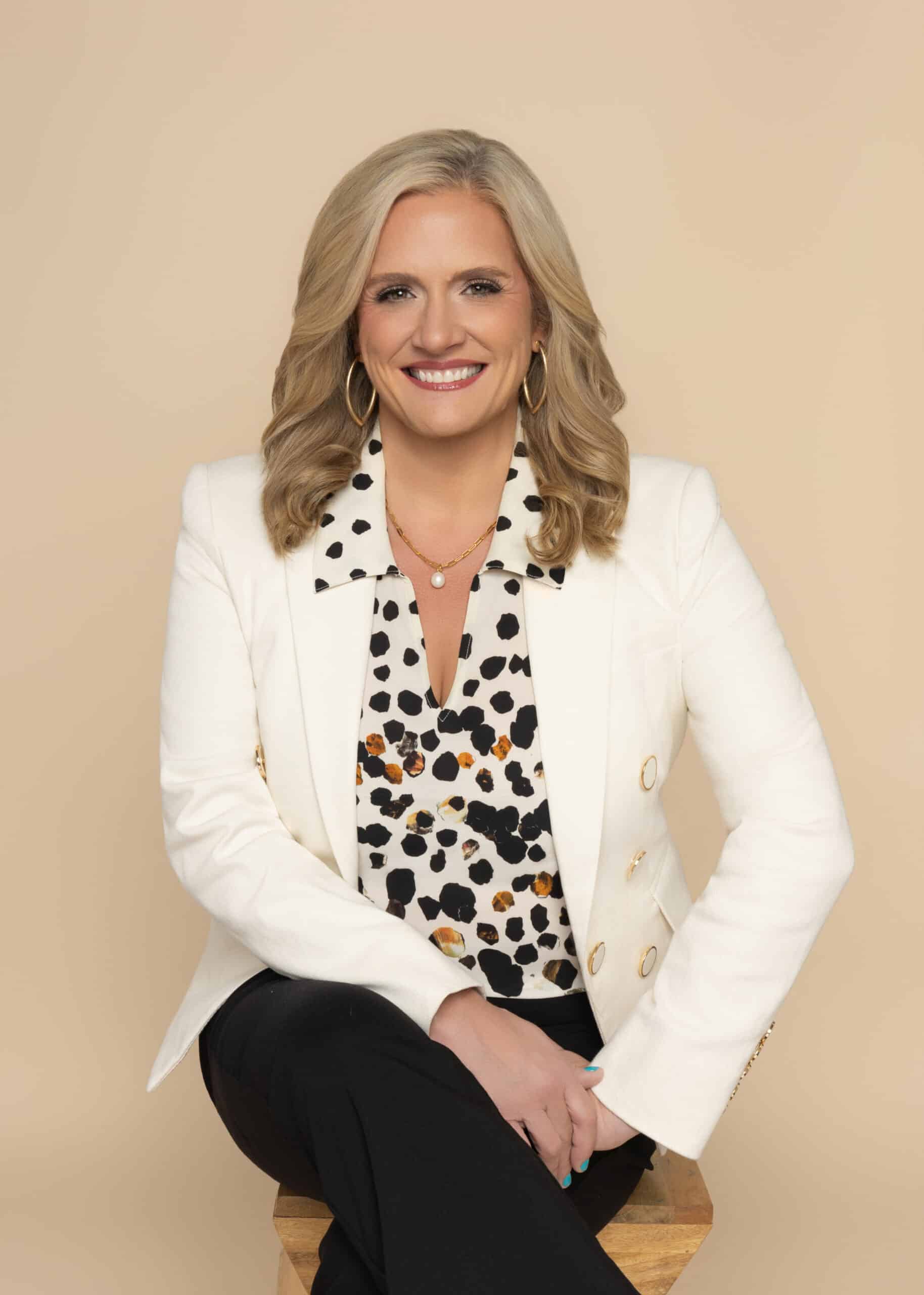 Estelle Winsett, former litigator and personal style strategist for women attorneys, in a cream blazer